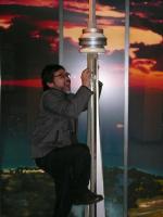 CN TOWER in Toronto…me tyring to climb up a miniature version of it, just the right size/height for me!!!