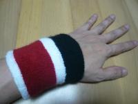 My left hand with a wrist supporter. It’s a must-have when practicing the guitar.